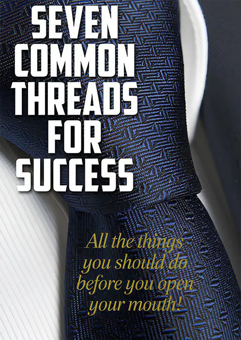 A close up of a tie with the words " common threads for success " written on it.